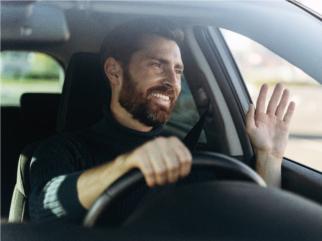 Drivers could be fined £1,000 for saying “thanks” at the wheel